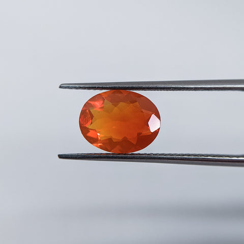 Fire Opal (10 mm x 7.7 mm) Oval